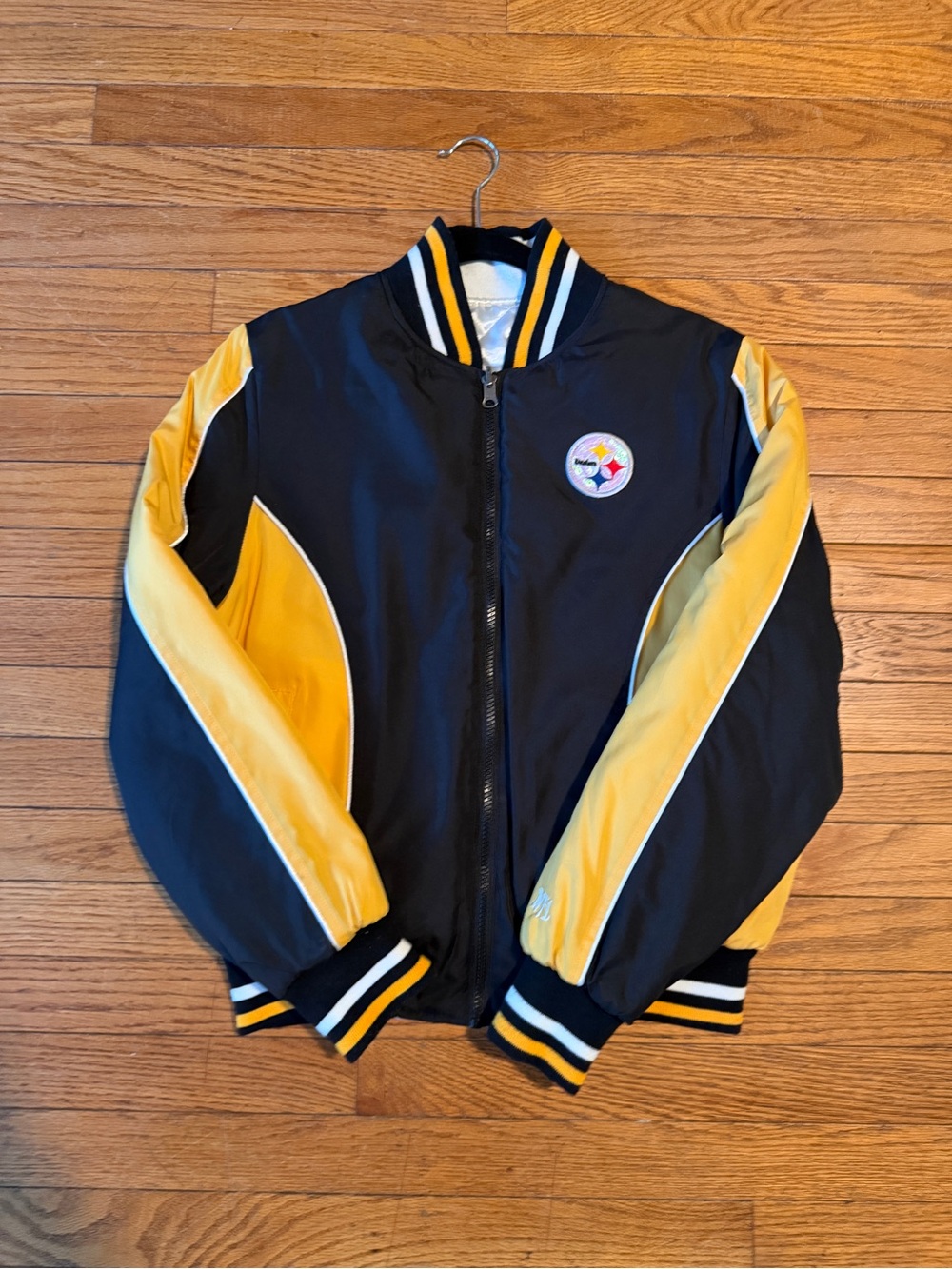 Women’s Steelers Black and Gold Bomber Jacket with Team Patch. 
Size Small